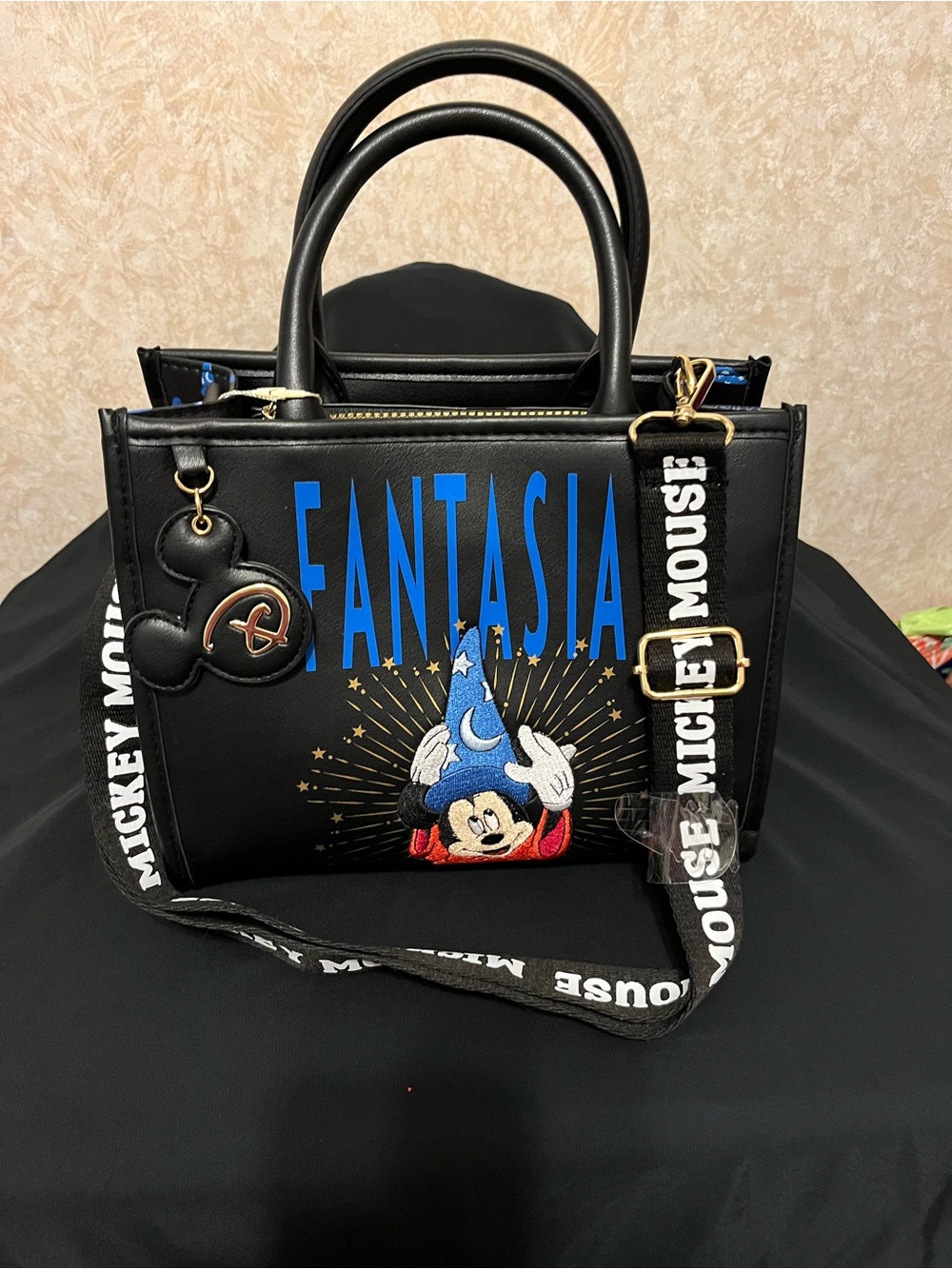 Disney Fantasia Black Satchel with Blue Lettering and Mickey Charm